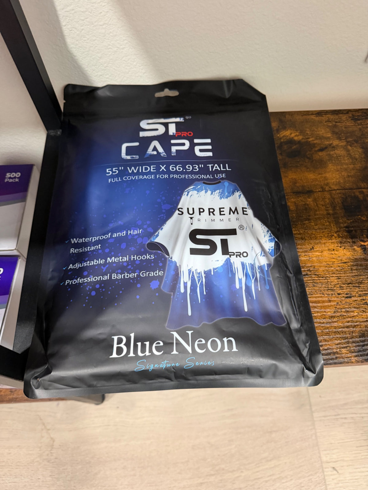 Supreme Trimmer Blue Neon Signature Series Barber Cape
