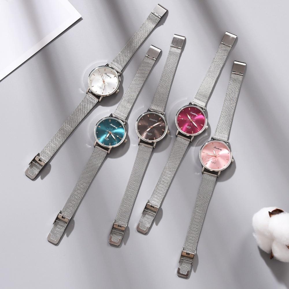 Women's Stylish Elegant Watch With Braided Steel Bracelet With Shiny Background Unique Design Perfect Gif